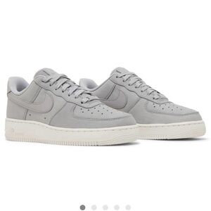 Nike Women's Air Force 1s Low-Top Sneakers in Light Gray and Off-White